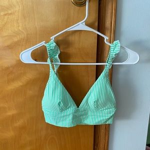 Cute green and white swim top with cute ruffle straps!! New with tags